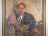 tableau représentant une femme avec un panier de fruits, dans un cadre doré