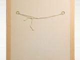 an image of a picture of a drawing of a person on a string