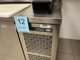 a machine that is sitting on top of a counter
