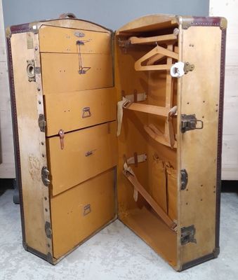 an open suitcase that is sitting on the floor