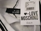 white t - shirt with i love moschino tag on it