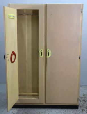 an image of a metal cabinet with two doors open on the floor