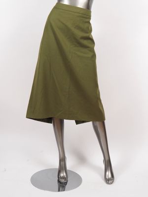 BURBERRY, London Jupe à fente en tissu vert. Fermeture à zip…