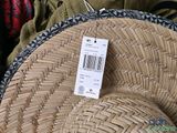 a close up of a straw hat with a price tag on it