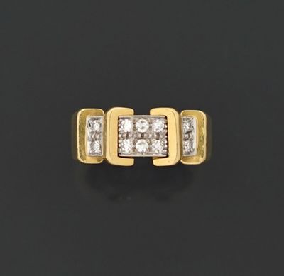 Bague en or jaune 18K 750 millièmes ornée de deux lignes de …