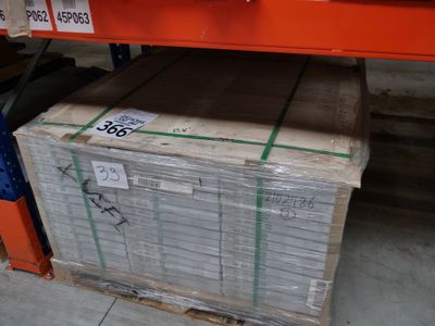 a stack of boxes sitting on a pallet in a warehouse