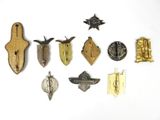 a lot of different metal items on a white surface