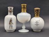 three vases that are sitting on a table