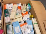 a box full of medical supplies sitting on the floor