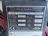 a close up of a parking meter on a street