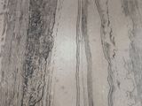 a close up of a piece of wood with a line of lines on it