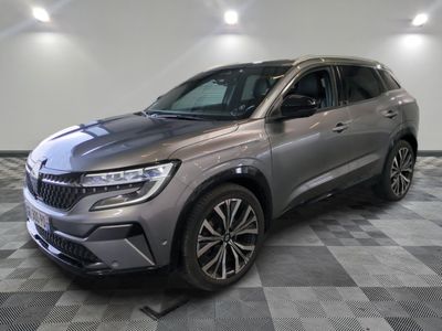 a grey 2020 buick enclave suv parked on a checkered floor