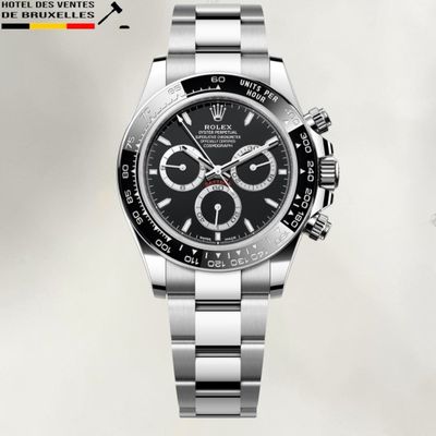 montre Rolex avec un cadran noir et un bracelet en acier inoxydable