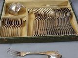 silverware in a case with spoons and spoons in it