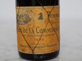 a bottle of wine that is sitting on a table