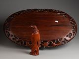 an image of a wooden tray with a bird on top of it