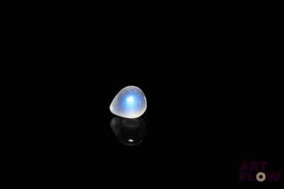 an image of a blue moons stone on a black surface