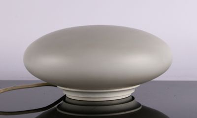 a white light that is on top of a black table