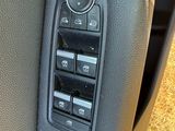 a close up of a control panel in a car