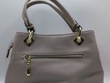 a close up of a purse with a zipper on it