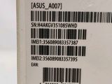 the back of a white box with a bar code on it