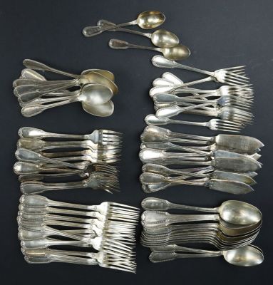 a lot of silver spoons and spoon spoons on a table