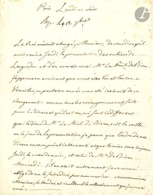 a letter written in cursive handwriting on a piece of paper