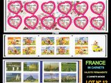 france stamps with hearts and cartoon characters on them on a black background