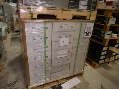 a large stack of boxes on a pallet in a warehouse