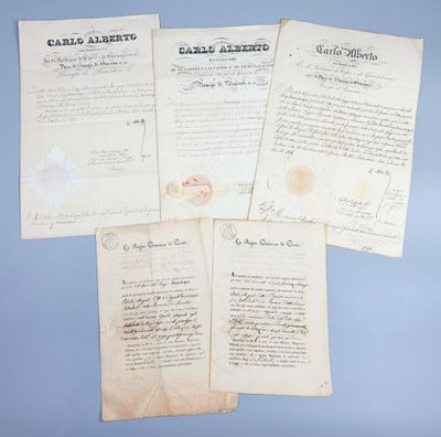 a group of five old papers with writing on them on a blue background
