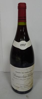 a bottle of wine that is sitting on a table