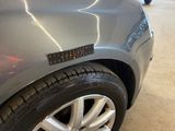 a close up of a car with a sticker on the front of it