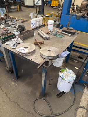 a table that has a lot of tools on it