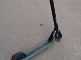 a scooter that is sitting on the ground
