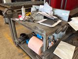 a workbench in a factory with a lot of tools on it