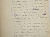 a handwritten letter written in french on a piece of paper