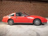 an image of a red car parked in a garage