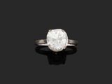 une bague à une pierre en diamant,