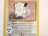 a pokemon card with a picture of a cat on it