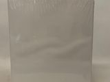 a close up of a piece of white plastic on a white background