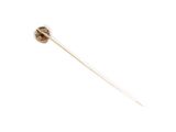 a close up of a stick on a white surface with a white background