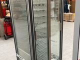 an image of a glass door refrigerator in a warehouse