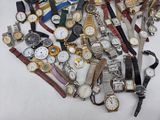 a lot of watches that are on a table