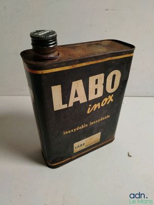 an old metal can that has a label on it