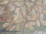a picture of a painting of a tree on the wall