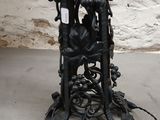 a black table with a clock on top of it
