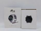 the box is open and the watch is in it ' s packaging