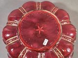 a red glass plate with a red star on it