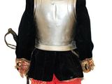 an image of a child dressed up in a knight costume