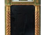 un miroir sur lequel est représenté un homme et un chien